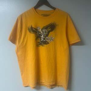 Vintage American Eagle Outfitters Yellow Graphic T-Shirt XL Standard & Tradition